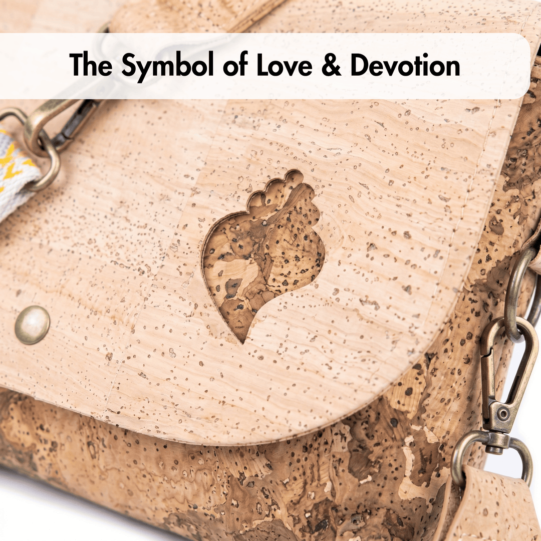 Cork handbag with a heart-shaped paw print design on a light background.