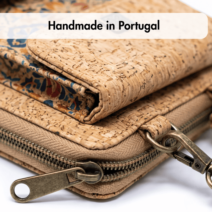 Cork wallet with brass zipper and clasp, labeled 'Handmade in Portugal'.