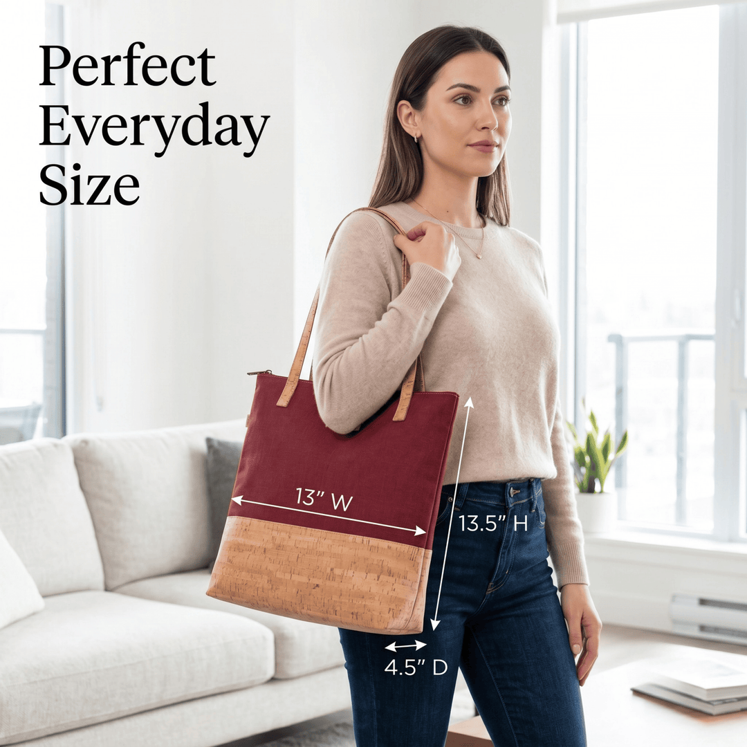 Woman holding a two-tone tote bag with measurements, standing in a bright room.
