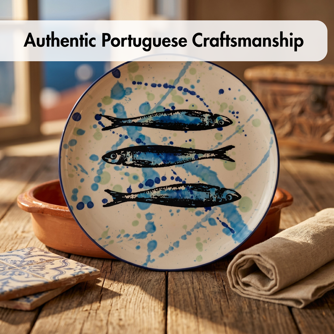 Ceramic plate with fish design on a wooden table, featuring 'Authentic Portuguese Craftsmanship' text.