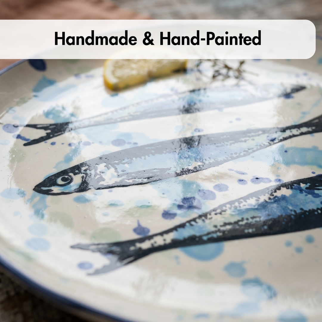 Handmade and hand-painted ceramic plate with fish design