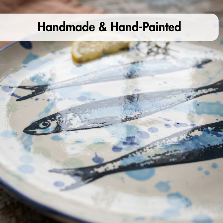 Handmade and hand-painted ceramic plate with fish design