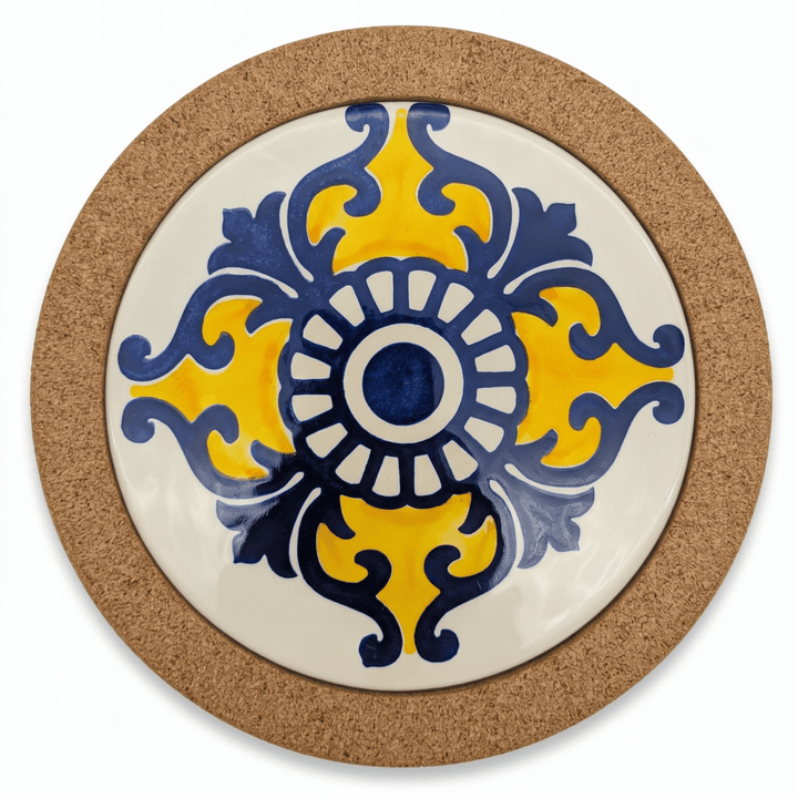 A round ceramic plate with a natural cork border and a central blue and yellow floral tile pattern on a white background.