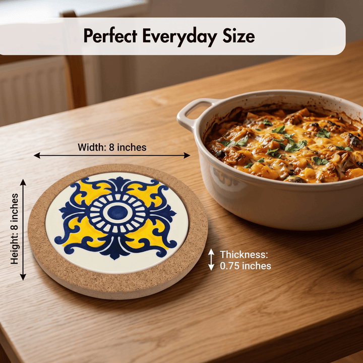 A round cork coaster with a blue and yellow ornamental tile design on a white background, shown on a wooden table next to a casserole dish. Text overlays indicate its dimensions: 8 inches by 8 inches, with a thickness of 0.