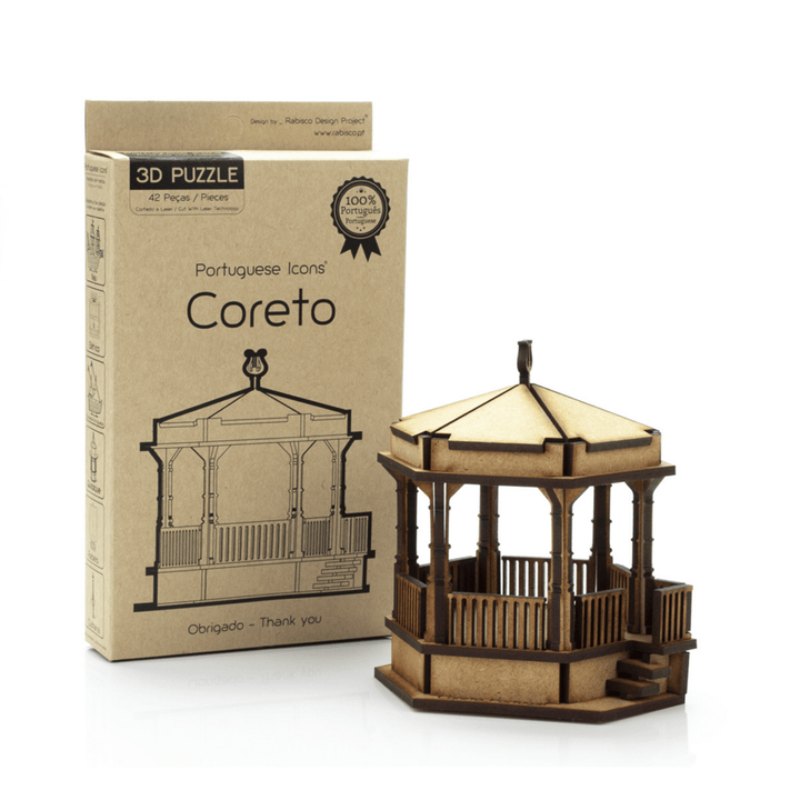 A wooden 3D puzzle model of a gazebo next to its cardboard packaging box, labeled &