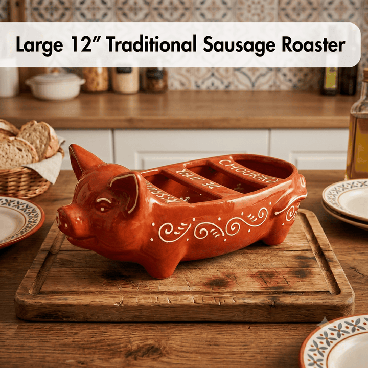 Red ceramic pig-shaped sausage roaster on a wooden cutting board with text 'Large 12" Traditional Sausage Roaster'.