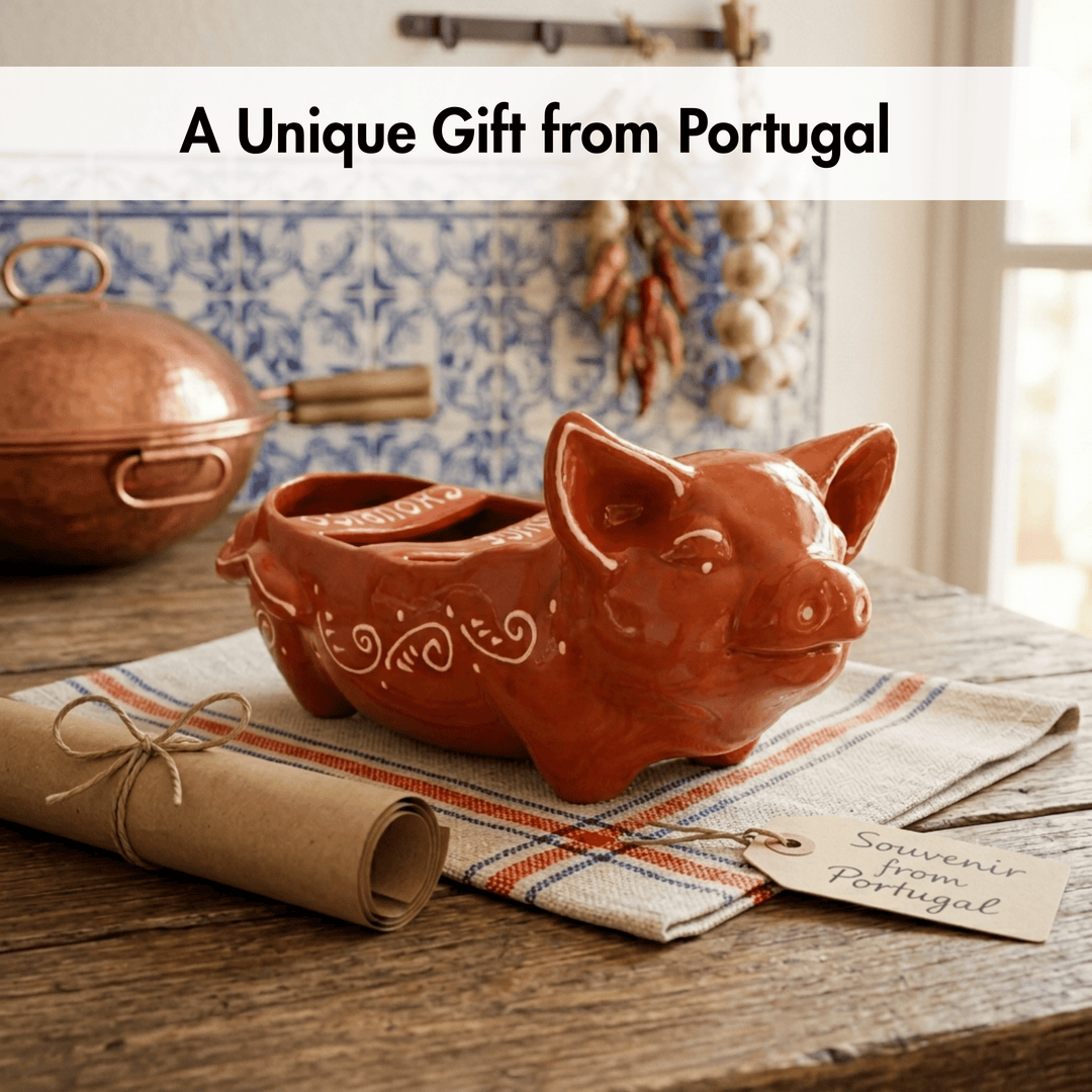 Ceramic pig-shaped container on a table with a tag indicating it's a souvenir from Portugal.