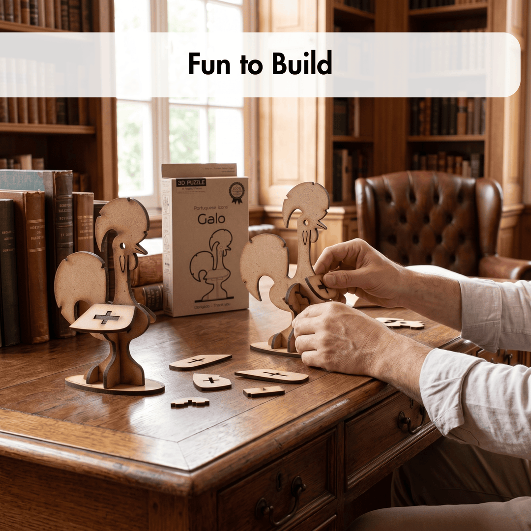 A person assembling wooden puzzle pieces on a dark wood desk in a warm, book-filled room. The product box labeled &