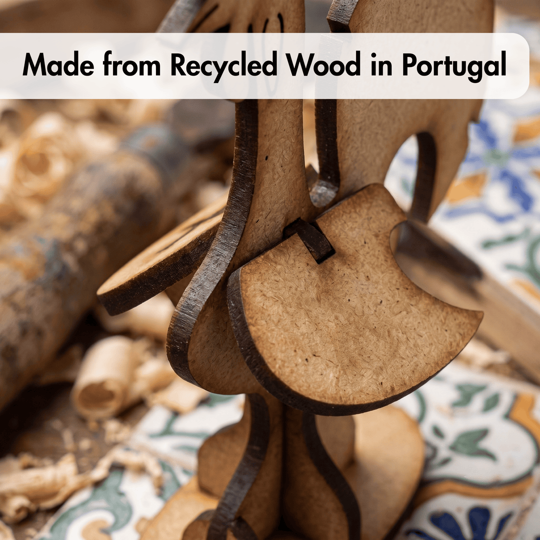 A close-up of a wooden decorative object made from layered recycled wood slices, with a text banner reading &