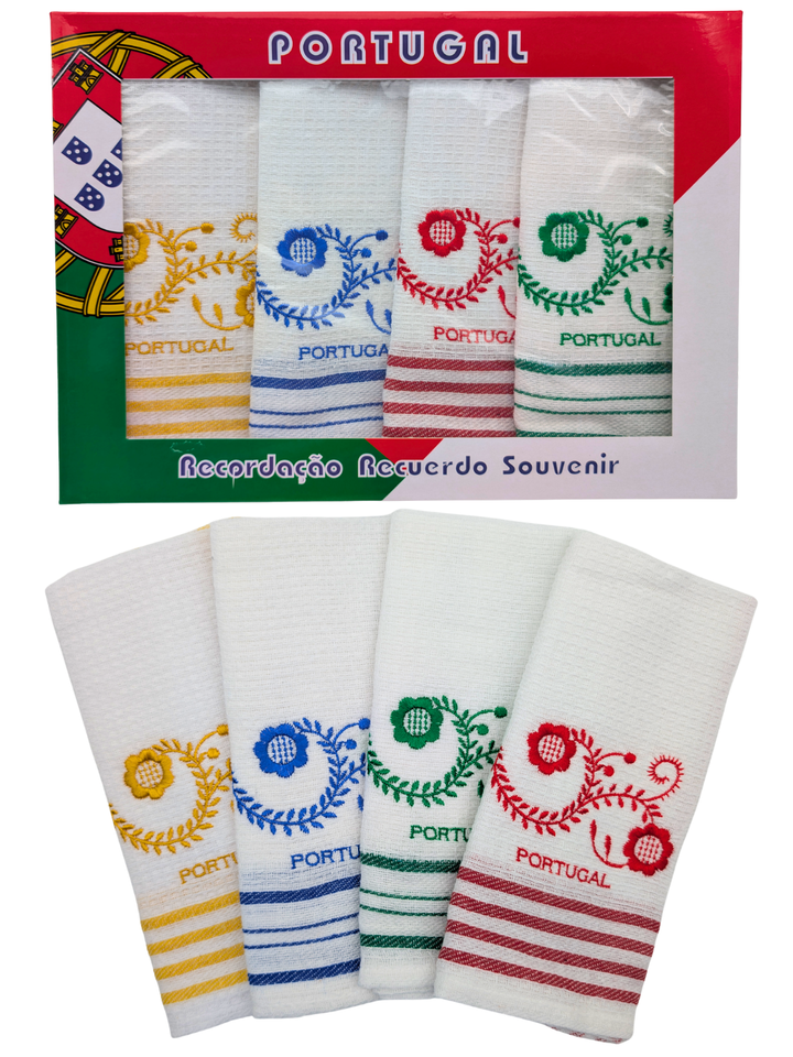 Set of white towels with colorful 'Portugal' designs in packaging