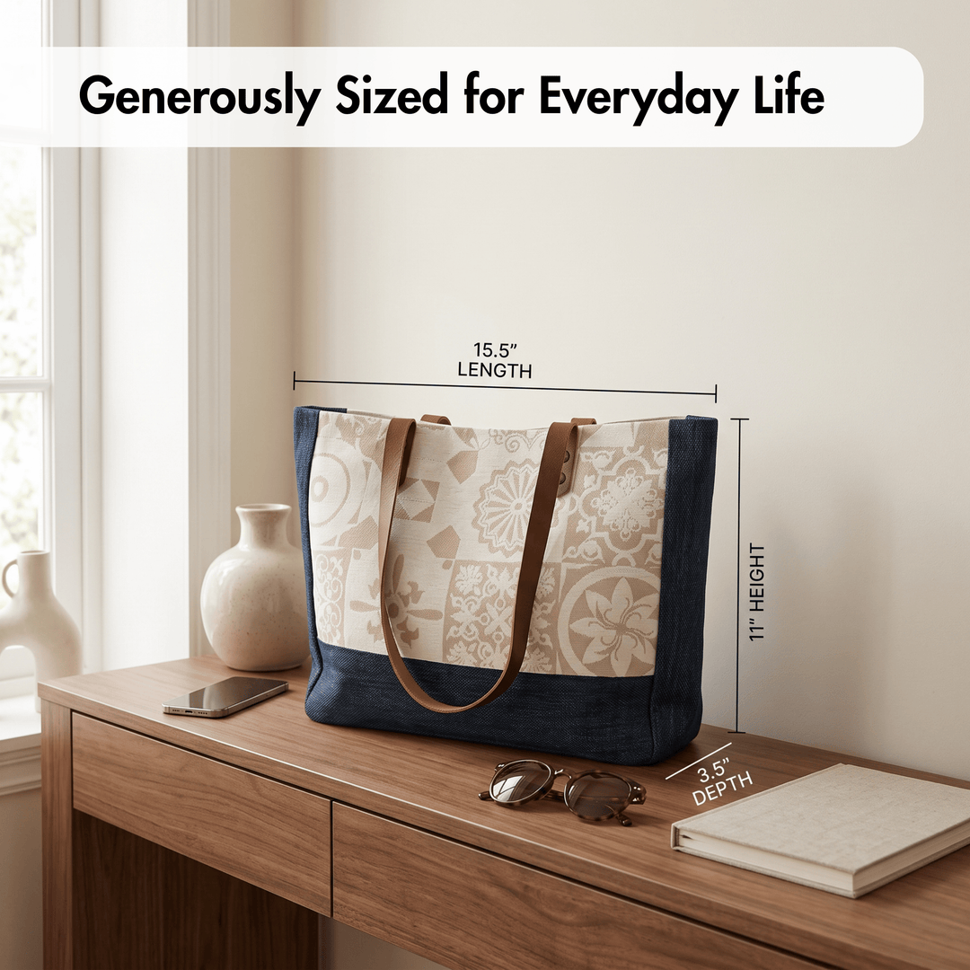 A tote bag displayed on a wooden desk in a real interior setting, with overlaid dimension lines showing 15.5 inches length, 11 inches height, and 3.