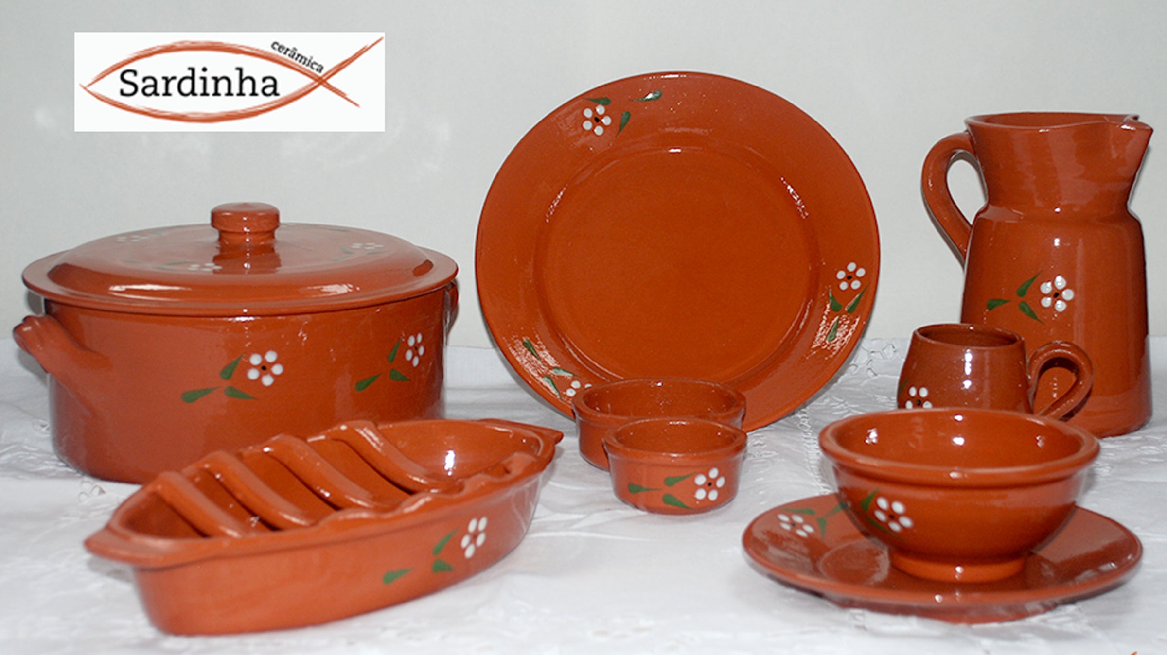 Handmade traditional Portuguese Terracotta clay cookware and servingware.