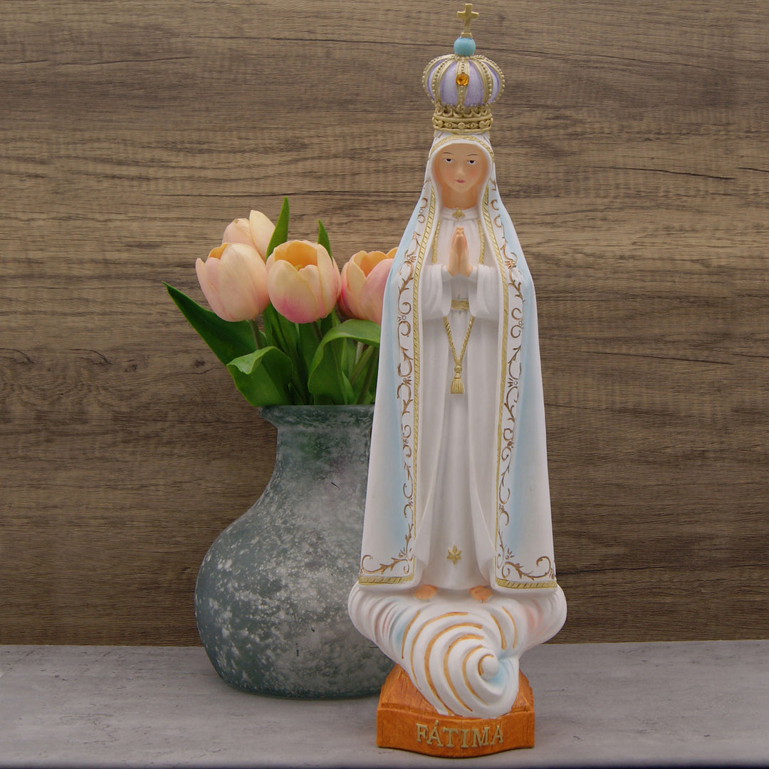 This statue of Our Lady of Fatima is 18 inch tall, a nice size to put anywhere in a home, office or church as a thoughtful addition to any space