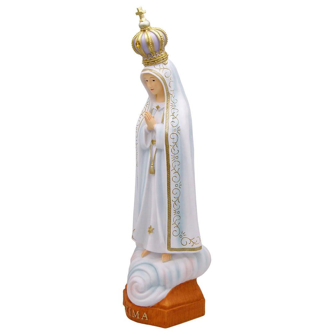 Our Lady of Fatima statue it's directly inspired by the image presented at the Chapel of Apparitions, showing Our Lady with a white mantle with light blue golden accents painted by hand.