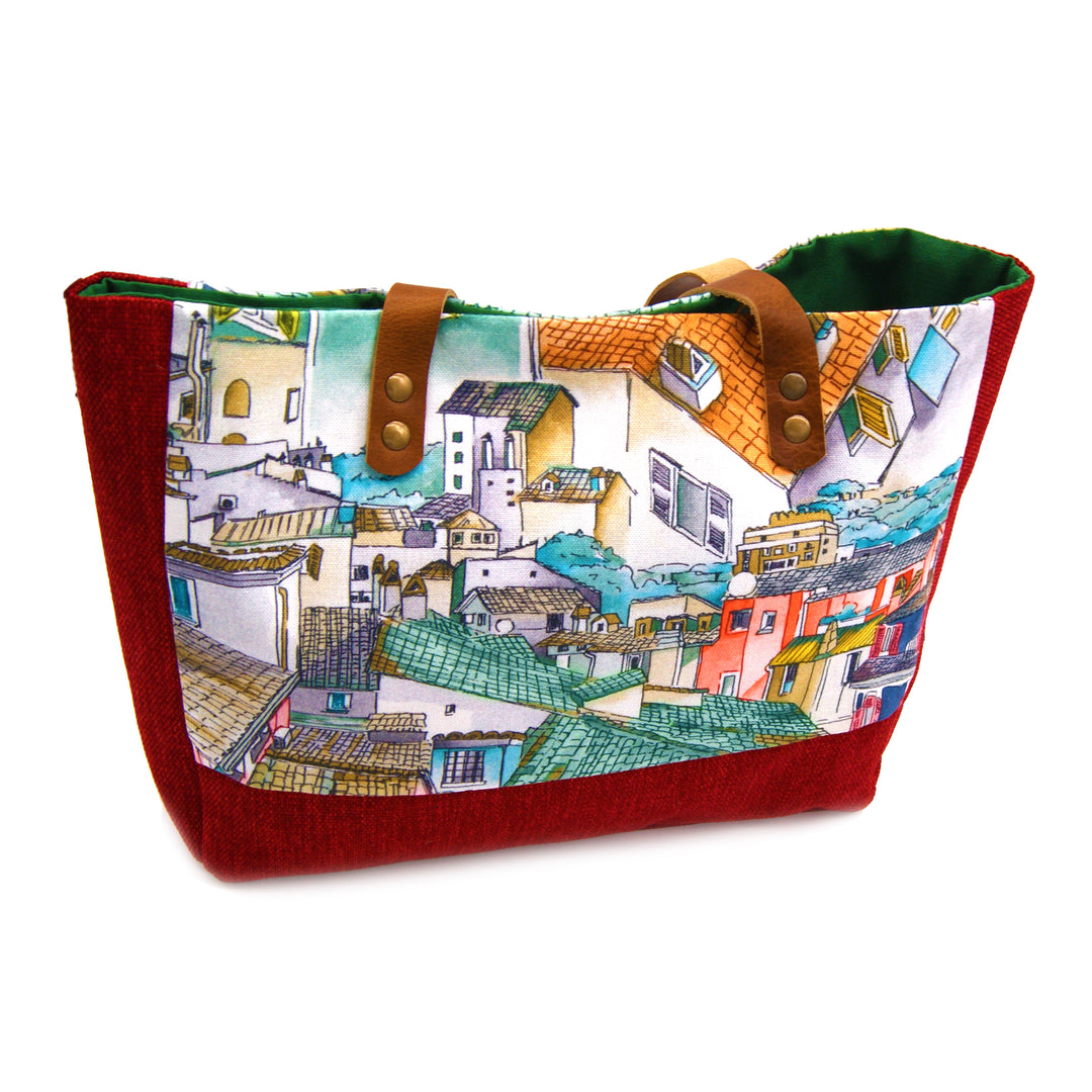 This red handmade purse has  vegetable ecologic tanning leather strap.