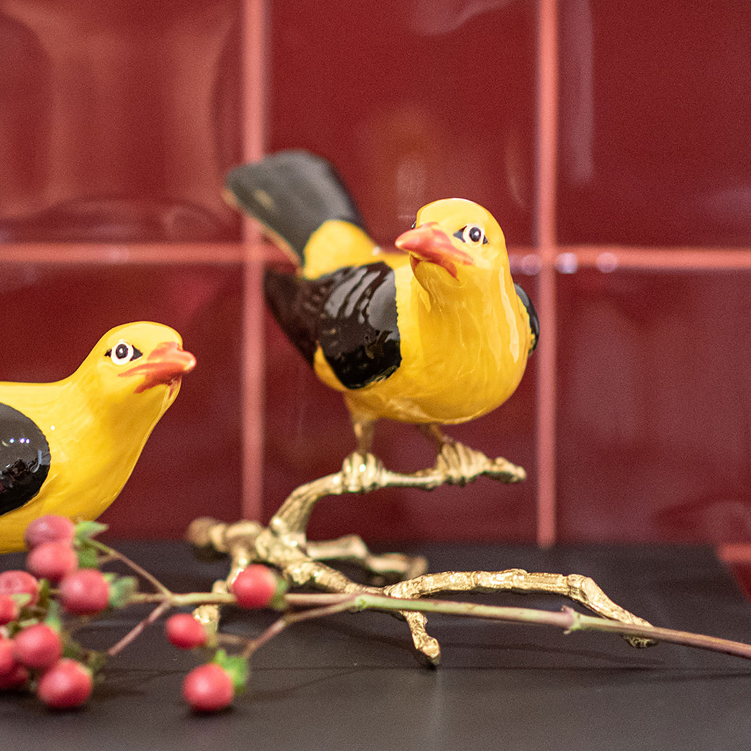 https://weareportugal.com/cdn/shop/products/Hand-Painted-Ceramic-Home-Decor-Bird-in-Branch-Figurine-The-creator-of-Golden-Oriole_2.jpg?v=1637616541&width=1080
