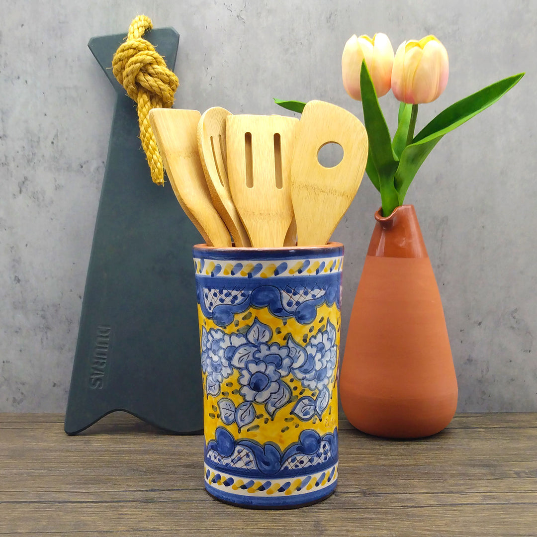 https://weareportugal.com/cdn/shop/products/Hand-Painted-Portuguese-Pottery-Blue-and-Yellow-Kitchen-Utensil-Holder_1.jpg?v=1646846787&width=1080