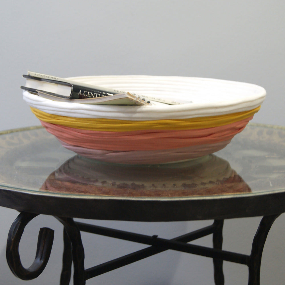 Whatever your needs are, this bowl will organise and beautify your space with its vibrant color pallet.