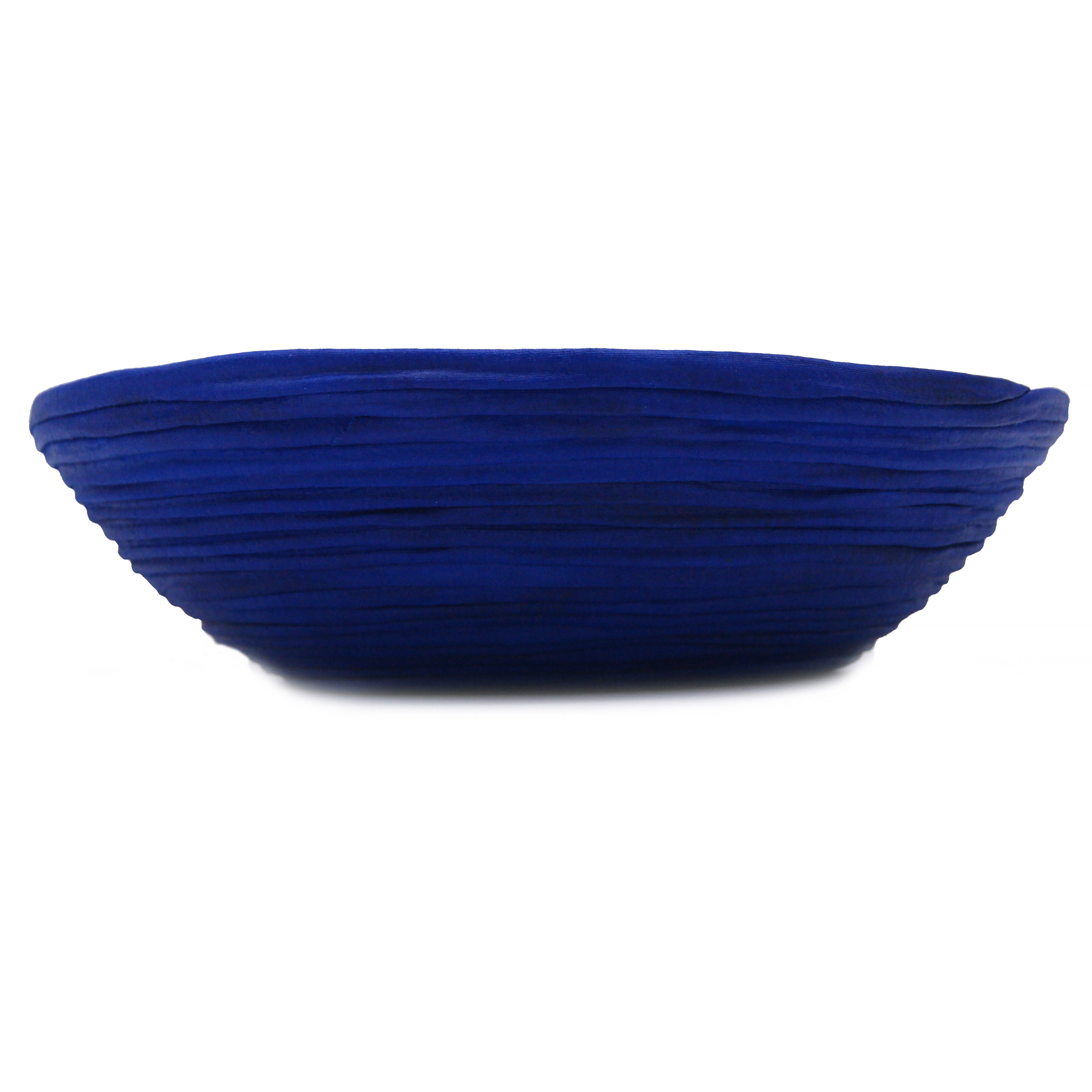 These bowls are developed through a sustainable process that hardens the fabric, making the pieces durable and sturdy