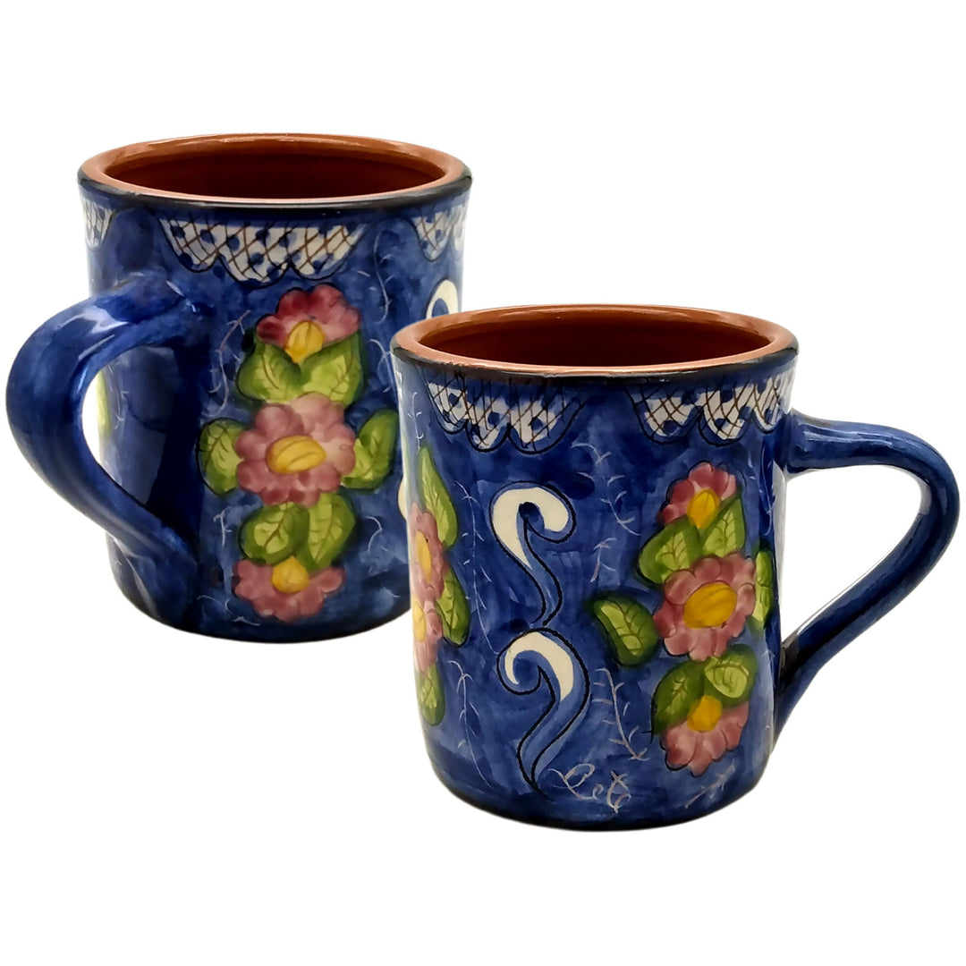 https://weareportugal.com/cdn/shop/products/Handmade-Hand-Painted-Portuguese-Pottery-Coffee-Mug-Floral-Set-of-2_4.jpg?v=1647452603&width=1080