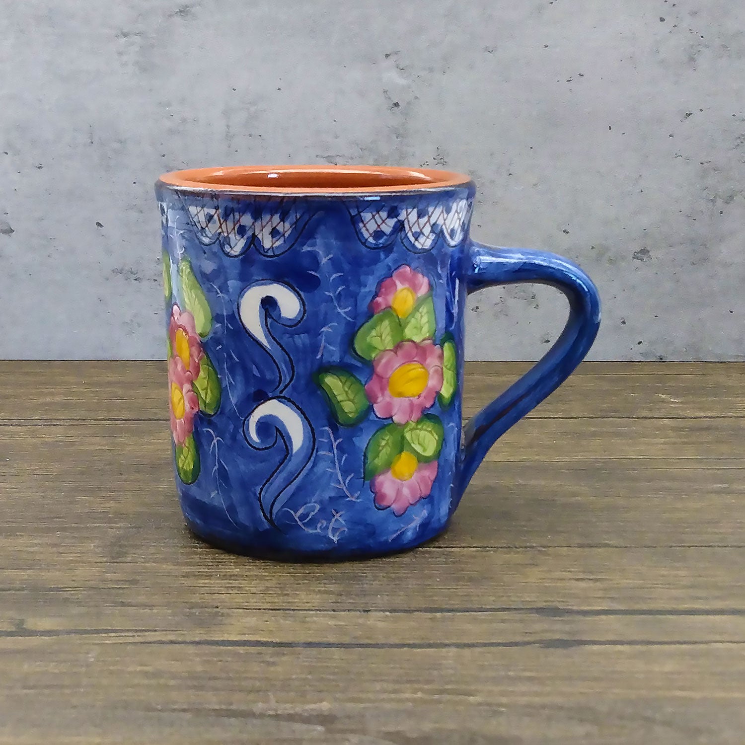 https://weareportugal.com/cdn/shop/products/Handmade-Hand-Painted-Portuguese-Pottery-Coffee-Mug-Floral-Set-of-2_7_1800x1800.jpg?v=1647452603