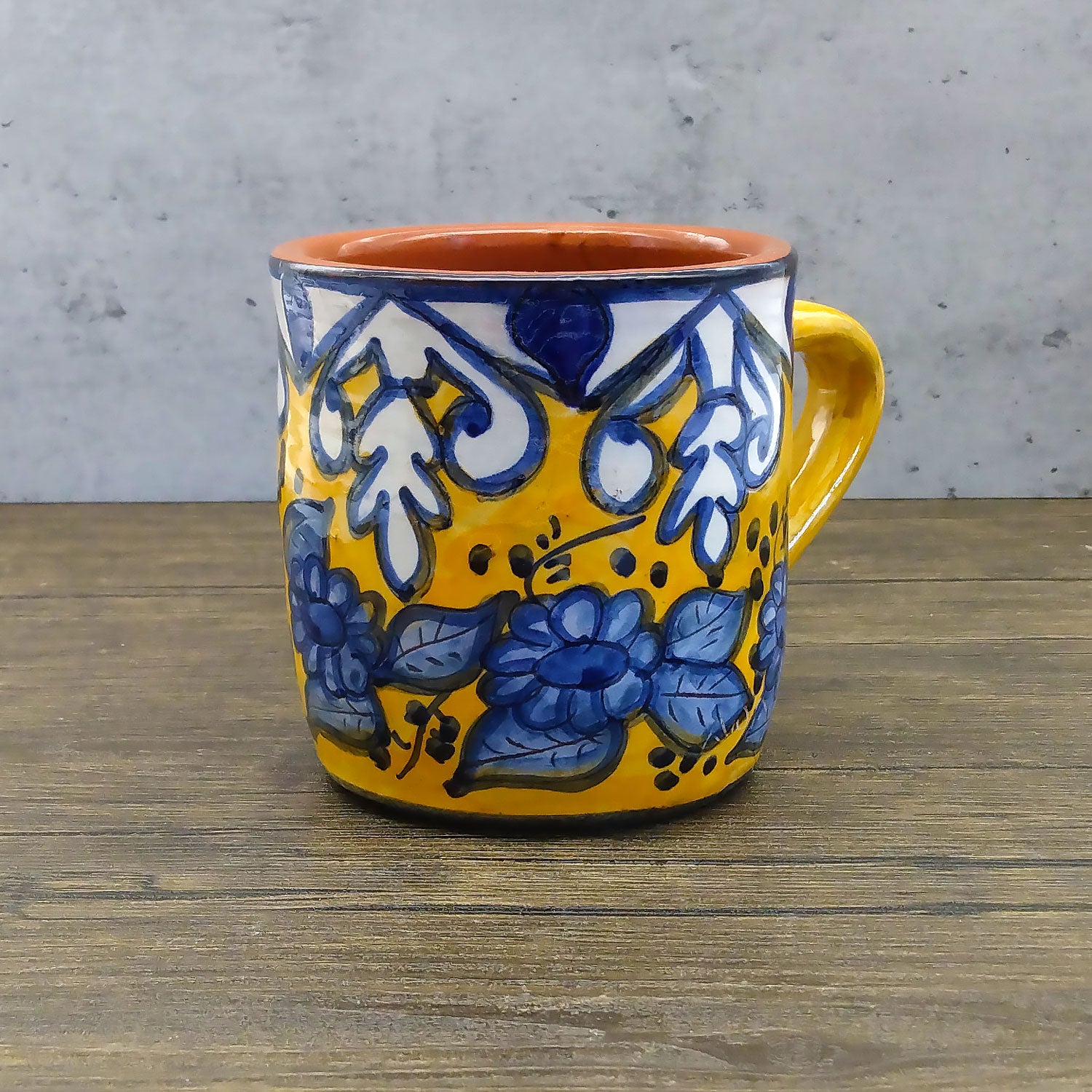 https://weareportugal.com/cdn/shop/products/Handmade-Hand-Painted-Portuguese-Pottery-Coffee-Mug-Yellow-Set-of-2_8_1800x1800.jpg?v=1647452810