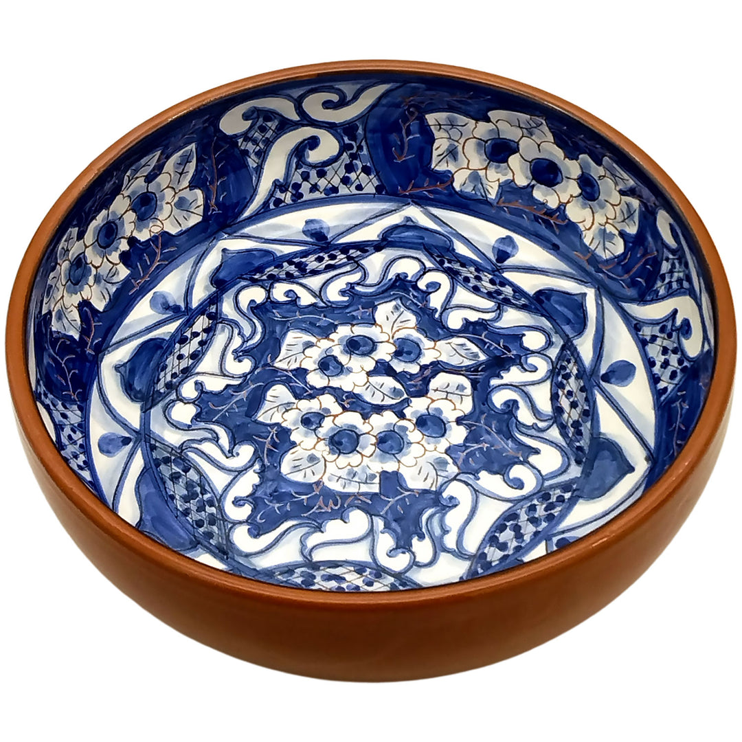 https://weareportugal.com/cdn/shop/products/Handmade-Hand-Painted-Portuguese-Pottery-Round-Serving-Bowl-Blue_1.jpg?v=1647455556&width=1080