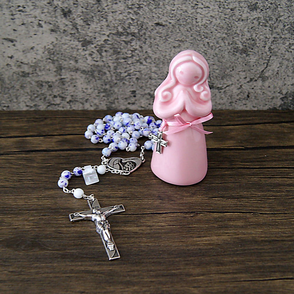 First Communion Praying Girl figure is the perfect gift for your loved one celebrating their first communion and will make a sweet keepsake, that will look great displayed on a shelf or desk, next to a framed picture of the big day.